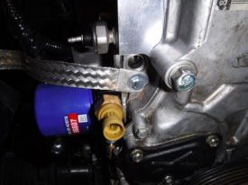 Timing cover ground location