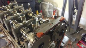 Remove the upper chain guide first