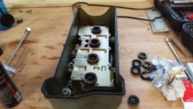Press the new gasket into the valve cover