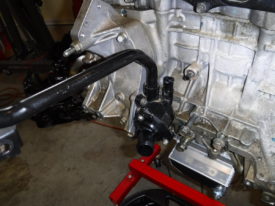 Bolted in place, the pipe can swing left to right