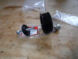 The pulley installs in this order