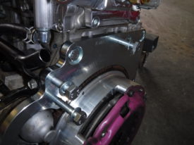 The upper three bolts go here