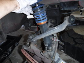 With the lower mounting bolt removed, it lifts right out