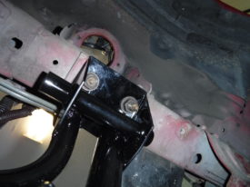From one side, the main nuts supporting it
