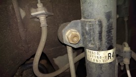Control arm link before removal