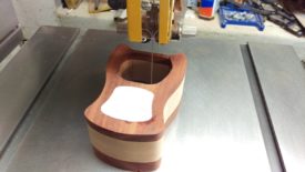 Cut the drawer out in one smooth pass, exiting through the entry point