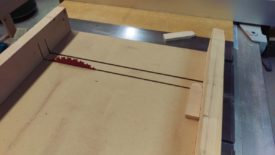 Cutting off with a table saw sled