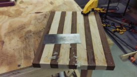 Cleaning up with a card scraper AKA cabinet scraper