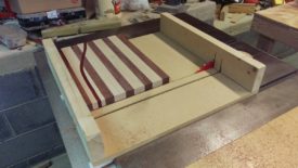 Flush cutting the sides on the sled