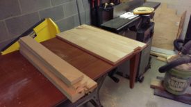 Old table and scrap ash