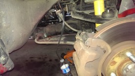 Run a hose from the slave bleeder to an empty bottle