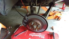 Support the hub so the brake line isn't stretched