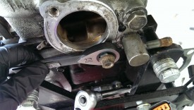 Use two nuts, with the wrench on the inner one, to back the stud out