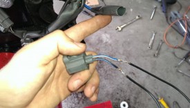 The plug after soldering wires to extend it