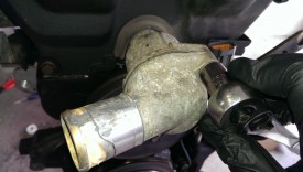 Pull the old thermostat cover