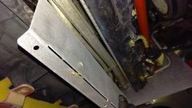 AC condenser sits in the way of the cooling fin