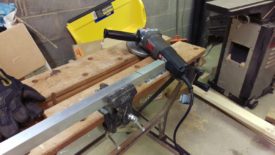 Cutting pieces of aluminum angle with a grinder and cutoff disc