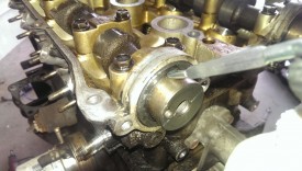 Removing cam seal with taped up paint opener