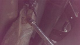 Removing bolt holding wire mount