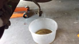 Let it hang over the bucket to drain