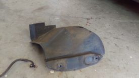 Removing this splash guard helps with access and takes only 4 bolts