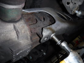 Remove the spline nut at the top of each bolt