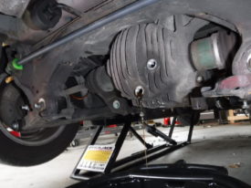 Remove the fill (top) bolt first, then the drain (bottom) bolt to drain the differential