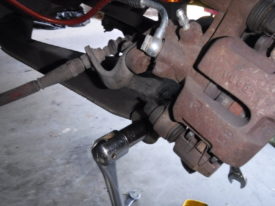 The LCA bolt should be loosened but not removed