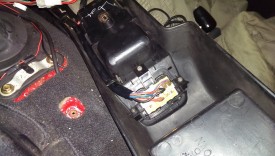 Screws hold the switch assembly to the underside