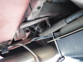 Removing the bolt on the driver's side