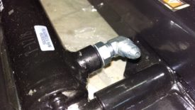 Orient the elbow properly before tightening down
