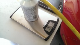 Refrigerant going out of can on scale