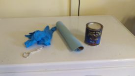 Gloves, shop towels, stain, and a paint can opener
