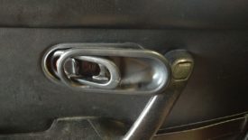 Once the screw is out, the cover sort of slides off