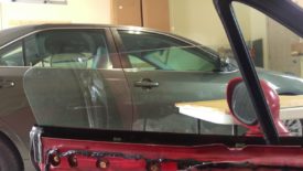 Roll the window halfway down