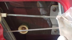 Remove both phillips head screws