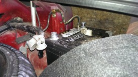 Undo the negative first; miata batteries are in the trunk