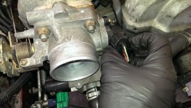 Plug near throttle body