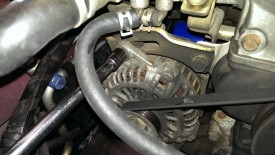 Alternator tension lock bolt