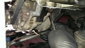 Lower mount bolt should be loosened, will remove later