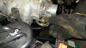 Push the accelerator down and slip the cable out