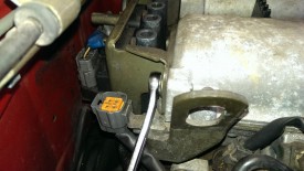 Coil pack mounting bolt on passenger side