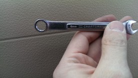 You want an 8mm box wrench for this job