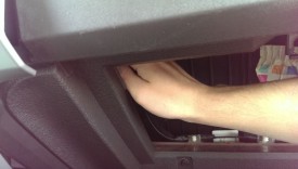 Reach up through the glove box