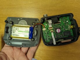 Battery secured to the back cover