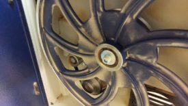 The idler tensioner is visible just behind the wheel
