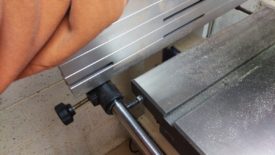 To remove, you have to slide it out to clear the pictured bolt