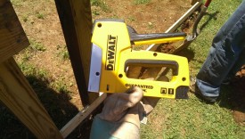 A cheap staple gun helps position the mesh