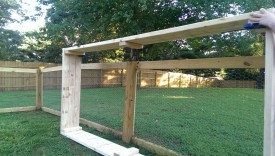 The top long piece can be held with clamps as it is screwed in