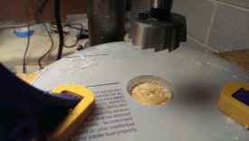 Drill partway with the 35mm bit to recess the bushing
